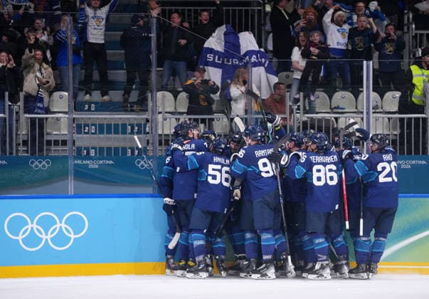 (260219) -- MILAN, Feb. 19, 2026 -- Finland s players celebrate victory after the Ice hockey, Eishockey men s play-offs quarterfinal between Finland and Switzerland at the Milan-Cortina 2026 Olympic Winter games, Winterspiele,Spiele, Summer games in Milan, Italy, Feb. 18, 2026. ) (MICO2026)ITALY-MILAN-OLYMPIC WINTER GAMES-ICE HOCKEY-MEN-PLAY-OFFS QUARTERFINALS-FIN VS SUI TaoxXiyi 