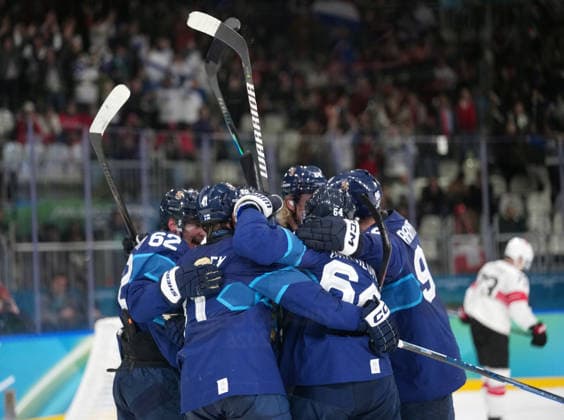 (260219) -- MILAN, Feb. 19, 2026 -- Finland s players celebrate a goal during the Ice hockey, Eishockey men s play-offs quarterfinal between Finland and Switzerland at the Milan-Cortina 2026 Olympic Winter games, Winterspiele,Spiele, Summer games in Milan, Italy, Feb. 18, 2026. ) (MICO2026)ITALY-MILAN-OLYMPIC WINTER GAMES-ICE HOCKEY-MEN-PLAY-OFFS QUARTERFINALS-FIN VS SUI TaoxXiyi 