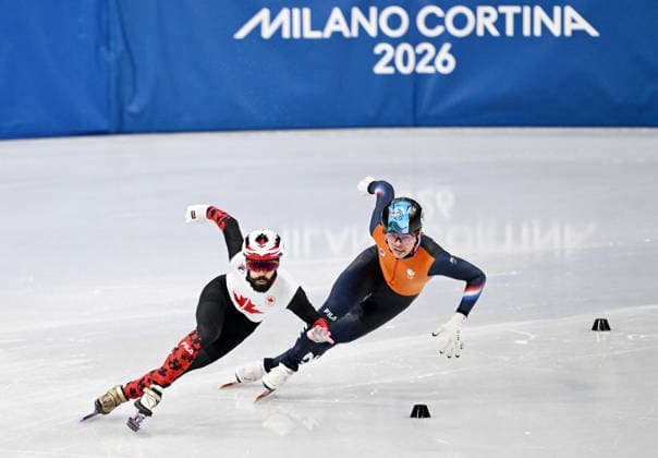 (260219) -- MILAN, Feb. 19, 2026 -- Steven Dubois (L) of Canada and Melle van t Wout of the Netherlands compete during the short track Speed skating, Eisschnelllauf men s 500m final A at the Milan-Cortina 2026 Olympic Winter games, Winterspiele,Spiele, Summer games in Milan, Italy, Feb. 18, 2026. ) (MICO2026)ITALY-MILAN-OLYMPIC WINTER GAMES-SHORT TRACK SPEED SKATING-MEN S 500M-FINALS ChengxMin 