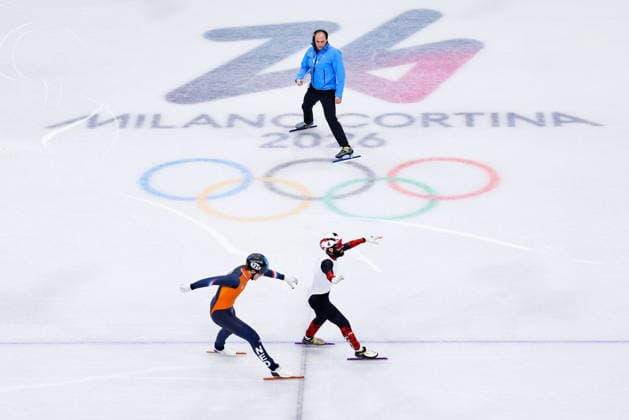 (260219) -- MILAN, Feb. 19, 2026 -- Steven Dubois (R) of Canada crosses the finish line during the short track Speed skating, Eisschnelllauf men s 500m final A at the Milan-Cortina 2026 Olympic Winter games, Winterspiele,Spiele, Summer games in Milan, Italy, Feb. 18, 2026. ) (MICO2026)ITALY-MILAN-OLYMPIC WINTER GAMES-SHORT TRACK SPEED SKATING-MEN S 500M-FINALS ChenxYichen 