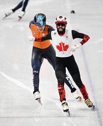 (260219) -- MILAN, Feb. 19, 2026 -- Steven Dubois (R) of Canada crosses the finish line during the short track Speed skating, Eisschnelllauf men s 500m final A at the Milan-Cortina 2026 Olympic Winter games, Winterspiele,Spiele, Summer games in Milan, Italy, Feb. 18, 2026. ) (MICO2026)ITALY-MILAN-OLYMPIC WINTER GAMES-SHORT TRACK SPEED SKATING-MEN S 500M-FINALS ChengxMin 