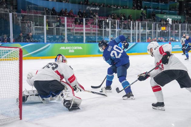 (260219) -- MILAN, Feb. 19, 2026 -- Sebastian Aho (C) of Finland shoots during the Ice hockey, Eishockey men s play-offs quarterfinal between Finland and Switzerland at the Milan-Cortina 2026 Olympic Winter games, Winterspiele,Spiele, Summer games in Milan, Italy, Feb. 18, 2026. ) (MICO2026)ITALY-MILAN-OLYMPIC WINTER GAMES-ICE HOCKEY-MEN-PLAY-OFFS QUARTERFINALS-FIN VS SUI SunxFei 