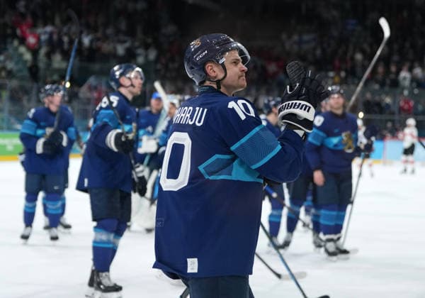 (260219) -- MILAN, Feb. 19, 2026 -- Henri Jokiharju of Finland celebrates victory after the Ice hockey, Eishockey men s play-offs quarterfinal between Finland and Switzerland at the Milan-Cortina 2026 Olympic Winter games, Winterspiele,Spiele, Summer games in Milan, Italy, Feb. 18, 2026. ) (MICO2026)ITALY-MILAN-OLYMPIC WINTER GAMES-ICE HOCKEY-MEN-PLAY-OFFS QUARTERFINALS-FIN VS SUI SunxFei 