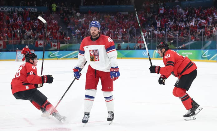 (260219) -- MILAN, Feb. 19, 2026 -- Nick Suzuki (R) of Canada celebrates a goal during the Ice hockey, Eishockey men s play-offs quarterfinals match between Canada and the Czech Republic at the Milan-Cortina 2026 Olympic Winter games, Winterspiele,Spiele, Summer games in Milan, Italy, Feb. 18, 2026. ) (MICO2026)ITALY-MILAN-OLYMPIC WINTER GAMES-ICE HOCKEY-MEN-PLAY-OFFS QUARTERFINALS-CAN VS CZE WangxKaiyan 