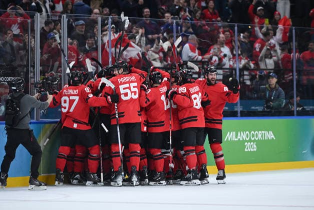 (260219) -- MILAN, Feb. 19, 2026 -- Players of Canada celebrate after winning the Ice hockey, Eishockey men s play-offs quarterfinals match between Canada and the Czech Republic at the Milan-Cortina 2026 Olympic Winter games, Winterspiele,Spiele, Summer games in Milan, Italy, Feb. 18, 2026. ) (MICO2026)ITALY-MILAN-OLYMPIC WINTER GAMES-ICE HOCKEY-MEN-PLAY-OFFS QUARTERFINALS-CAN VS CZE ZhangxHaofu 