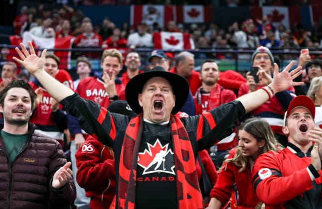 (260219) -- MILAN, Feb. 19, 2026 -- Fans of Canada cheer during the Ice hockey, Eishockey men s play-offs quarterfinals match between Canada and the Czech Republic at the Milan-Cortina 2026 Olympic Winter games, Winterspiele,Spiele, Summer games in Milan, Italy, Feb. 18, 2026. ) (MICO2026)ITALY-MILAN-OLYMPIC WINTER GAMES-ICE HOCKEY-MEN-PLAY-OFFS QUARTERFINALS-CAN VS CZE WangxKaiyan 