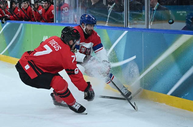 (260219) -- MILAN, Feb. 19, 2026 -- Michal Kempny (R) of the Czech Republic vies with Devon Toews of Canada during the Ice hockey, Eishockey men s play-offs quarterfinals match between Canada and the Czech Republic at the Milan-Cortina 2026 Olympic Winter games, Winterspiele,Spiele, Summer games in Milan, Italy, Feb. 18, 2026. ) (MICO2026)ITALY-MILAN-OLYMPIC WINTER GAMES-ICE HOCKEY-MEN-PLAY-OFFS QUARTERFINALS-CAN VS CZE ZhangxHaofu 