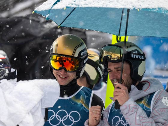 OLYMPICS - Winter Olympic Games, Olympische Spiele, Olympia, OS Milano Cortina 2026 PREDAZZO,ITALY,19.FEB.26 - OLYMPICS, NORDIC SKIING, NORDIC COMBINED, Ski jumping, Skispringen, Ski, nordisch - Winter Olympic Games Milano Cortina 2026, team sprint, large hill. Image shows the rejoicing of Geiger Vinzenz and Rydzek Johannes (GER).  GEPAxpictures xOliverxLerch