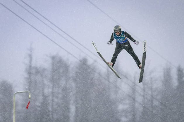 OLYMPICS - Winter Olympic Games, Olympische Spiele, Olympia, OS Milano Cortina 2026 PREDAZZO,ITALY,19.FEB.26 - OLYMPICS, NORDIC SKIING, NORDIC COMBINED, Ski jumping, Skispringen, Ski, nordisch - Winter Olympic Games Milano Cortina 2026, team sprint, large hill. Image shows Marco Heinis (FRA).  GEPAxpictures xMatthiasxTrinkl