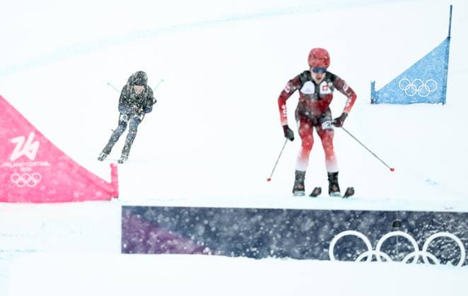 ITALY, LOMBARDY - FEBRUARY 19, 2026: Nikita Filippov (back) of Russia Jon Kistler of Switzerland compete in the men s ski mountaineering sprint heats during the 2026 Winter Olympic Games, Olympische Spiele, Olympia, OS on the Stelvio slope of the Bormio Ski Resort in Bormio, Province of Sondrio. Mikhail Tereshchenko TASS  88936973