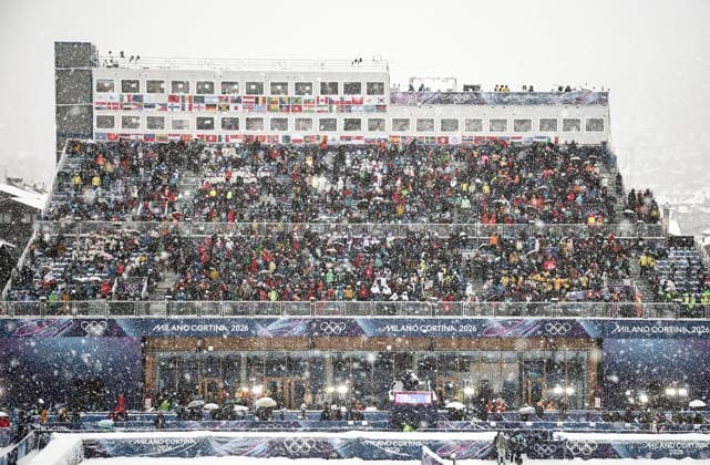 ITALY, LOMBARDY - FEBRUARY 19, 2026: Spectators attend the men s ski mountaineering sprint heats during the 2026 Winter Olympic Games, Olympische Spiele, Olympia, OS on the Stelvio slope of the Bormio Ski Resort in Bormio, Province of Sondrio. Mikhail Tereshchenko TASS  88939910