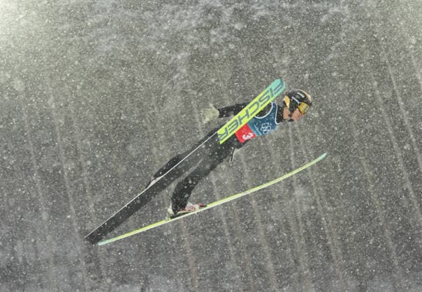(260219) -- PREDAZZO, Feb. 19, 2026 -- Zhao Zihe of China competes during the Ski jumping, Skispringen, Ski, nordisch trial round of the nordic combined team sprint at the 2026 Milan-Cortina Winter Olympics in Predazzo, Italy, Feb. 19, 2026. ) (MICO2026)ITALY-PREDAZZO-OLYMPIC Winter games, Winterspiele,Spiele, Summer games NORDIC COMBINED-TEAM SPRINT MengxYongmin 