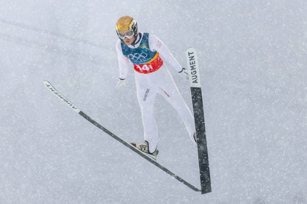 (260219) -- PREDAZZO, Feb. 19, 2026 -- Stefan Rettenegger of Austria competes during the Ski jumping, Skispringen, Ski, nordisch competition round of the nordic combined team sprint at the 2026 Milan-Cortina Winter Olympics in Predazzo, Italy, Feb. 19, 2026. ) (MICO2026)ITALY-PREDAZZO-OLYMPIC Winter games, Winterspiele,Spiele, Summer games NORDIC COMBINED-TEAM SPRINT HuangxWei 