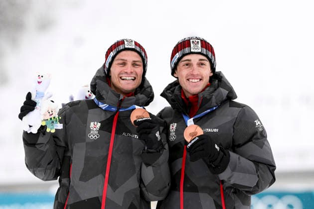 OLYMPICS - Winter Olympic Games, Olympische Spiele, Olympia, OS Milano Cortina 2026 TESERO,ITALY,19.FEB.26 - OLYMPICS, NORDIC SKIING, NORDIC COMBINED - Winter Olympic Games Milano Cortina 2026, team sprint, medal ceremony. Image shows the rejoicing of Johannes Lamparter and Stefan Rettenegger (AUT). Keywords: medal.  GEPAxpictures xMatthiasxTrinkl