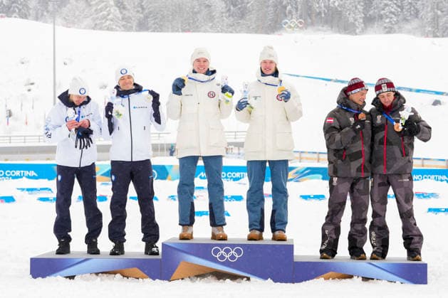 Winter Olympics in Milan Cortina 2026 Val di Fiemme, Italy 20260219. Silver winners Ilkka Herola and Eero Hirvonen from Finland, gold winners Jens Luraas Oftebro and Andreas Skoglund from Norway and bronze winners Stefan Rettenegger and Johannes Lamparter from Austria on the podium after the combined team sprint 2 x 7.5 km Tesero CC-Stadium during the Winter Olympics in Milano Cortina 2026. Photo: Lise Aaserud NTB Val di Fiemme Italy EDITORIAL USE ONLY. RESTRICTED USE FOR BETTING COMPANIES Ref:_SPOqTKWsWPNOPc.jpg *** Winter Olympics in Milan Cortina 2026 Val di Fiemme, Italy 20260219 Silver winners Ilkka Herola and Eero Hirvonen from Finland, gold winners Jens Luraas Oftebro and Andreas Skoglund from Norway and bronze winners Stefan Rettenegger and Johannes Lamparter from Austria on the podium after the combined team sprint 2 x 7 5 km Tesero CC Stadium during the Winter Olympics in Milano Cortina 2026 Photo Lise Aaserud NTB Val di Fiemme Italy EDITORIAL USE ONLY RESTRICTED USE FOR BETTING COMPANIES  Copyright: xLisexAserudx xNTBx