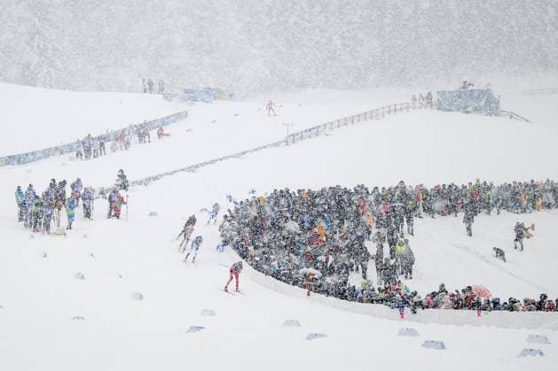 SKOGLUND Andreas (Norwegen), HEROLA Ilkka (Finnland), RYDZEK Johannes (Deutschland) im Schnee, daneben Fans Zuschauer, ITA, Olympische Spiele Milano Cortina 2026, Olympia, Nordische Kombination, Teamsprint, 2 x 7,5 km Langlauf, 19.02.2026 ITA, Olympische Spiele Milano Cortina 2026, Olympia, Nordische Kombination, Teamsprint, 2 x 7,5 km Langlauf, 19.02.2026 Tesero *** SKOGLUND Andreas Norway , HEROLA Ilkka Finland , RYDZEK Johannes Germany in the snow, next to fans spectators, ITA, Olympic Games Milano Cortina 2026, Olympic Games, Nordic Combined, Team Sprint, 2 x 7.5 km Cross-Country Skiing, 19 02 2026 ITA, Olympic Games Milano Cortina 2026, Olympic Games, Nordic Combined, Team Sprint, 2 x 7.5 km Cross-Country Skiing, 19 02 2026 Tesero Copyright: xEibner-Pressefoto Memmlerx EP_MMR