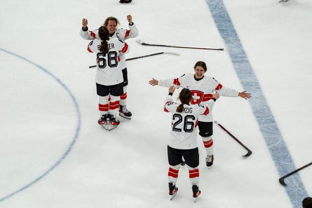 February 19, 2026, Milan, Lombardy, Italy: Team Switzerland celebrates after winning against Team Sweden, 2:1 in overtime in the Womans Bronze Medal Game at the Milano Rho Ice hockey, Eishockey Arena in MILAN, Italy during the 2026 Milano Cortina Winter Olympics. Olympics 2026: Milano Cortina: Ice Hockey Womens: Bronze Medal Game: SUI 2:1 SWE  - ZUMAa161 20260219_oly_a161_028 Copyright: xWalterxG.xArcex