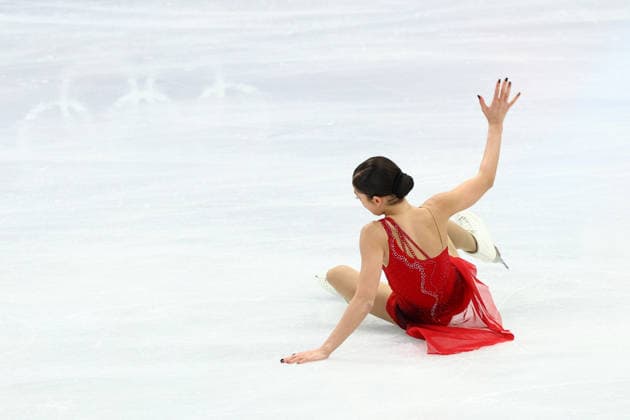 February 19, 2026, Milan, Lombardy, Italy: ADELIIA PETROSIAN of Individual Neutral Athletes (AIN) falls during the warm up before skating her Women s Single Skating free program in the Figure skating, Eiskunstlauf at the Milano Cortina 2026 Winter Olympic Games, Olympische Spiele, Olympia, OS Olympics 2026: Milano Cortina: Figure Skating Women Single Skating  - ZUMAc179 20260219_oly_c179_091 Copyright: xMickaelxChavetx