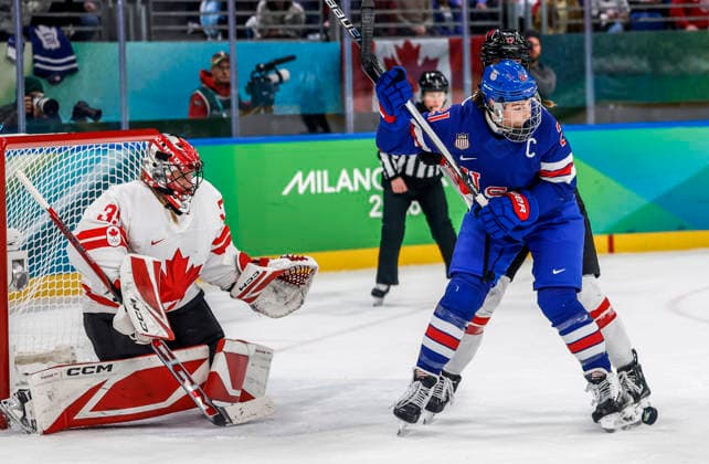 The puck bounces off the skate of United States Hilary Knight (21) in front of Canada s Gwyneth Philips in the second period of the Women s Hockey Gold Medal Game between Canada and the USA at the Milano Santagiulia Ice hockey, Eishockey Arena in Milan, Italy, on Thursday, February 19, 2026.  OLY20260219323a AARONxJOSEFCZYK