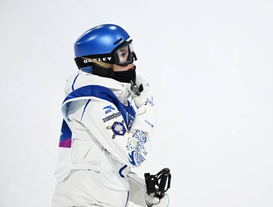 (260219) -- LIVIGNO, Feb. 19, 2026 -- Gu Ailing of China reacts during the qualification of freestyle skiing women s freeski halfpipe at the Milan-Cortina 2026 Olympic Winter games, Winterspiele,Spiele, Summer games in Livigno, Italy, Feb. 19, 2026. ) (MICO2026)ITALY-LIVIGNO-OLYMPIC WINTER GAMES-FREESTYLE SKIING-WOMEN S FREESKI HALFPIPE-QUALIFICATION WuxHuiwo 