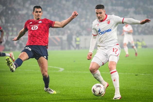 February 19, 2026, Villeneuve-D ascq, France, France: Aissa MANDI of Lille and Bruno DUARTE of Crvena Zvezda during the UEFA Europa League match between Lille OSC (LOSC) and Crvena Zvezda at Pierre Mauroy Stadium on February 19, 2026 in Villeneuve-d Ascq near Lille, France. Villeneuve-D ascq France - ZUMAm308 20260219_zsp_m308_005 Copyright: xMatthieuxMirvillex