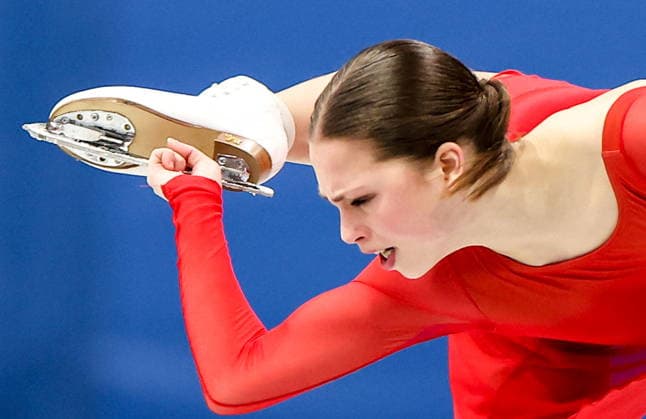 ITALY, MILAN - FEBRUARY 19, 2026: Nina Pinzarrone of Belgium performs her routine in the women s singles free skating programme at the 2026 Winter Olympic Games, Olympische Spiele, Olympia, OS at Milano Ice Skating Arena. Peter Kovalev TASS  88966873