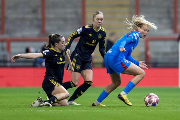 19th February 2026; Leigh Sports Village, Manchester, England; Womens Champions League Football, Manchester United, ManU versus Atletico Madrid; Synne Jensen of Atletico Madrid under pressure from Maya Le Tissier of Manchester United Women  TimxWilliams Content restricted for UK based newspaper