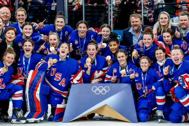 Team USA poses with their gold medals after their overtime win in the Gold Medal Game between Canada and the USA at the Milano Santagiulia Ice hockey, Eishockey Arena in Milan, Italy, on Thursday, February 19, 2026. The USA won the game 2-1 to win the gold medal. Canada wins the Silver and Switzerland won the Bronze medal.  OLY20260219338 AARONxJOSEFCZYK