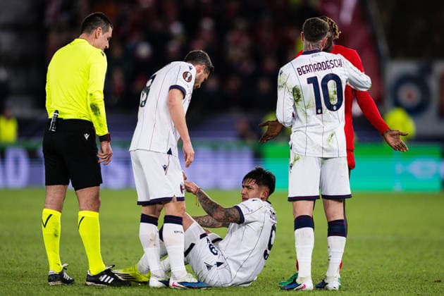 260219 Santiago Thomas Castro of Bologna in pain during the UEFA Europa League football match between Brann and Bologna on February 19, 2026 in Bergen. Photo: Marius Simensen BILDBYRAN COP 238 MM0056 bbeng bologna brann football fotball fotboll soccer uefa europa league Copyright: MARIUSxSIMENSEN BB260219ZG106