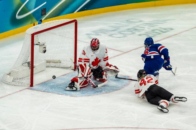 February 19, 2026, Milan, Lombardy, Italy: Defender MEGAN KELLER (5) of Team United States scores the winning goal against Team Canada, 2:1 in overtime in the Womans Gold Medal Game at the Milano Santagiulia Ice hockey, Eishockey Arena in MILAN, Italy during the 2026 Milano Cortina Winter Olympics. Milan Italy - ZUMAa161 20260219_oly_a161_076 Copyright: xWalterxG.xArcex