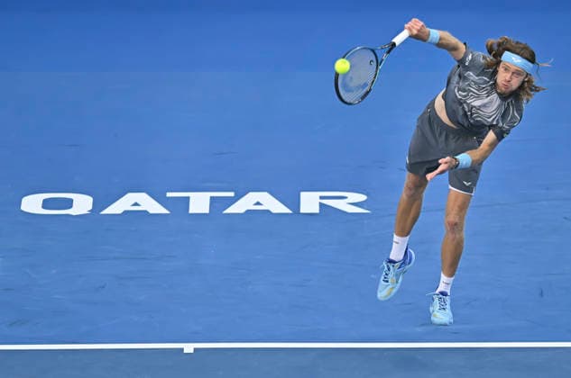 February 19, 2026, Doha, Qatar: Andrey Rublev of Russia plays against Stefanos Tsitsipas of Greece (not in view) during their men s singles quarter final match at the ATP, Tennis Herren Qatar Exxonmobil Open 2026 tennis tournament at the Khalifa International Tennis Complex. Andrey Rublev won against Andrey Rublev 6-3,7-6. ATP Qatar Exxonmobil Open 2026 Tennis Tournament In Doha - 19 Feb 2026  - ZUMAs197 20260219_aaa_s197_181 Copyright: xNoushadxVariyattiyakkalx
