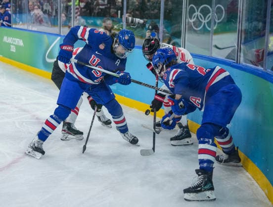 (260220) -- MILAN, Feb. 20, 2026 -- Players of both teams vie for the puck during the Ice hockey, Eishockey women s gold medal game between the United States and Canada at the Milan-Cortina 2026 Olympic Winter games, Winterspiele,Spiele, Summer games in Milan, Italy, Feb. 19, 2026. ) (MICO2026)ITALY-MILAN-OLYMPIC WINTER GAMES-ICE HOCKEY-WOMEN-GOLD MEDAL GAME-USA VS CAN SunxFei 
