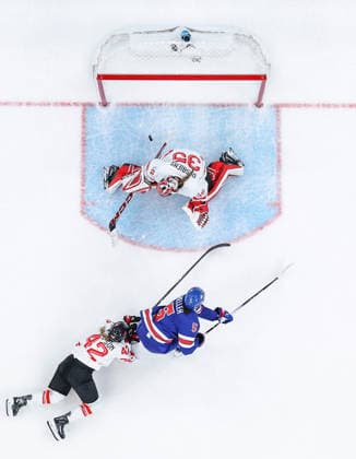 (260220) -- MILAN, Feb. 20, 2026 -- Megan Keller (C) of the United States shoots to score during the Ice hockey, Eishockey women s gold medal game between the United States and Canada at the Milan-Cortina 2026 Olympic Winter games, Winterspiele,Spiele, Summer games in Milan, Italy, Feb. 19, 2026. ) (MICO2026)ITALY-MILAN-OLYMPIC WINTER GAMES-ICE HOCKEY-WOMEN-GOLD MEDAL GAME-USA VS CAN SunxFei 