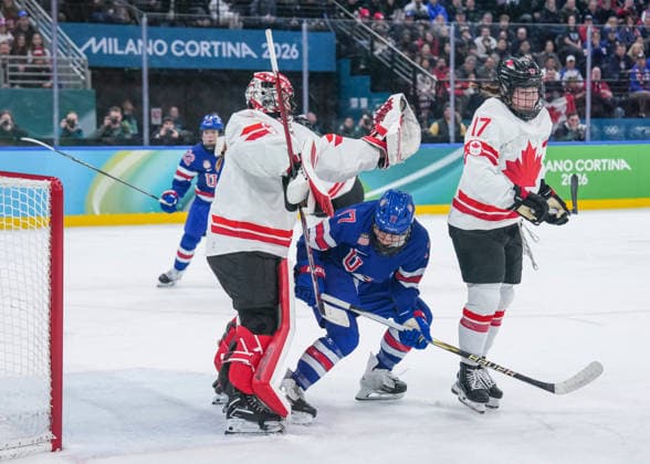 (260220) -- MILAN, Feb. 20, 2026 -- Ann-Renee Desbiens (L), goalkeeper of Canada makes a save during the Ice hockey, Eishockey women s gold medal game between the United States and Canada at the Milan-Cortina 2026 Olympic Winter games, Winterspiele,Spiele, Summer games in Milan, Italy, Feb. 19, 2026. ) (MICO2026)ITALY-MILAN-OLYMPIC WINTER GAMES-ICE HOCKEY-WOMEN-GOLD MEDAL GAME-USA VS CAN SunxFei 
