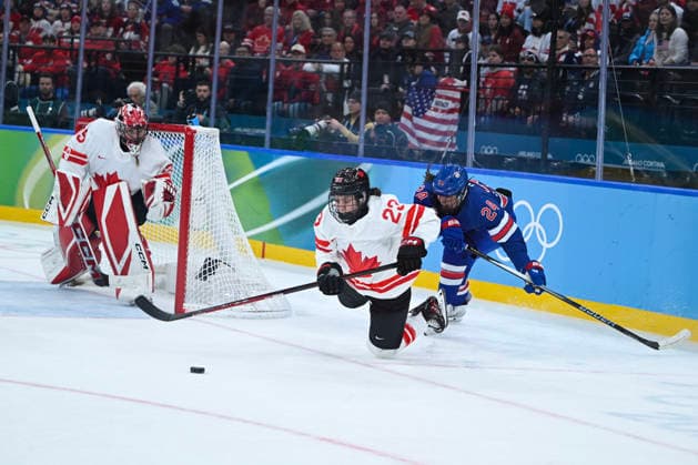 (260220) -- MILAN, Feb. 20, 2026 -- Joy Dunne (R) of the United States makes a foul during the Ice hockey, Eishockey women s gold medal game between the United States and Canada at the Milan-Cortina 2026 Olympic Winter games, Winterspiele,Spiele, Summer games in Milan, Italy, Feb. 19, 2026. ) (MICO2026)ITALY-MILAN-OLYMPIC WINTER GAMES-ICE HOCKEY-WOMEN-GOLD MEDAL GAME-USA VS CAN ZhangxHaofu 