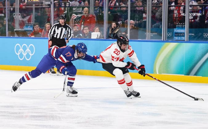 (260220) -- MILAN, Feb. 20, 2026 -- Britta Curl (L) of the United States fights for the puck against Sarah Nurse of Canada during the Ice hockey, Eishockey women s gold medal game between the United States and Canada at the Milan-Cortina 2026 Olympic Winter games, Winterspiele,Spiele, Summer games in Milan, Italy, Feb. 19, 2026. ) (MICO2026)ITALY-MILAN-OLYMPIC WINTER GAMES-ICE HOCKEY-WOMEN-GOLD MEDAL GAME-USA VS CAN WangxKaiyan 