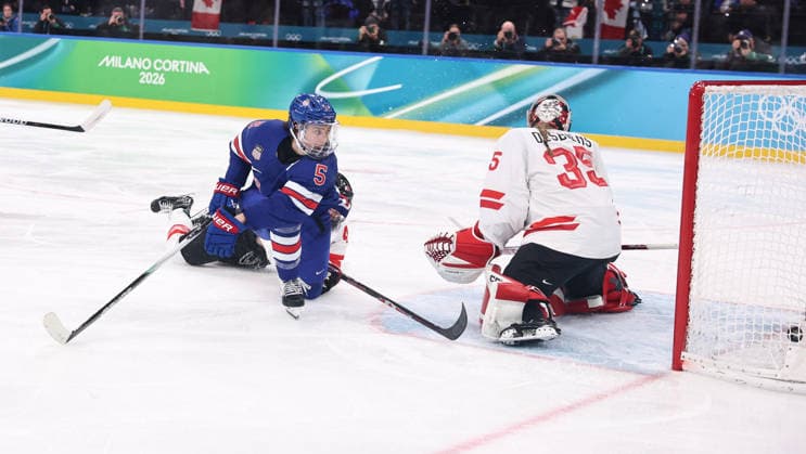 (260220) -- MILAN, Feb. 20, 2026 -- Megan Keller (L) of the United States scores the winning goal against Canada during the Ice hockey, Eishockey women s gold medal game between the United States and Canada at the Milan-Cortina 2026 Olympic Winter games, Winterspiele,Spiele, Summer games in Milan, Italy, Feb. 19, 2026. ) (MICO2026)ITALY-MILAN-OLYMPIC WINTER GAMES-ICE HOCKEY-WOMEN-GOLD MEDAL GAME-USA VS CAN WangxKaiyan 