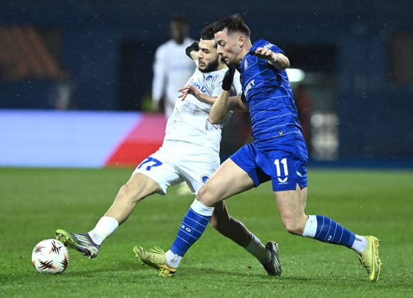 (260220) -- ZAGREB, Feb. 20, 2026 -- Zakaria el Ouahdi of KRC Genk vies with Arber Hoxha (R) of GNK Dinamo during the UEFA Europa League 2025 26 Knockout Play-off First Leg match between GNK Dinamo and KRC Genk at Stadion Maksimir in Zagreb, Croatia, on Feb. 19, 2026. (Photo by PIXSELL via Xinhua) (SP)CROATIA-ZAGREB-FOOTBALL-UEFA-GNK DINAMO VS KRC GENK MarkoxLukunic 