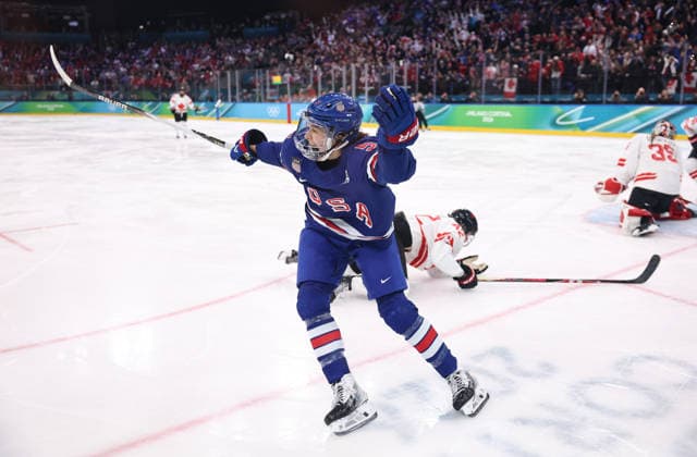 (260220) -- MILAN, Feb. 20, 2026 -- Megan Keller of the United States celebrates after scoring the winning goal against Canada during the Ice hockey, Eishockey women s gold medal game between the United States and Canada at the Milan-Cortina 2026 Olympic Winter games, Winterspiele,Spiele, Summer games in Milan, Italy, Feb. 19, 2026. ) (MICO2026)ITALY-MILAN-OLYMPIC WINTER GAMES-ICE HOCKEY-WOMEN-GOLD MEDAL GAME-USA VS CAN WangxKaiyan 