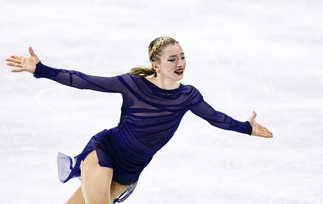 Milan Cortina Olympics: Figure skating, Eiskunstlauf Amber Glenn of the United States performs in the women s figure skating free program at the Milan Cortina Olympics at Milano Ice Skating Arena in Milan on Feb. 19, 2026.  A14AA0005306680P