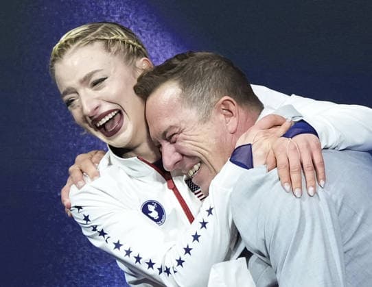 Milan Cortina Olympics: Figure skating, Eiskunstlauf Amber Glenn (L) of the United States reacts to her score in the women s figure skating free program at the Milan Cortina Olympics at Milano Ice Skating Arena in Milan on Feb. 19, 2026.  A14AA0005306710P