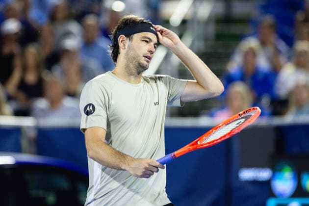 2026 Delray Beach Open - Day 4 - Taylor Fritz Of USA v Rafael Jodar Of Spain Taylor Fritz of the USA adjusts his headband against Rafael Jodar of Spain during their match on Day 4 of the Delray Beach Open at the Delray Tennis Center in Delray Beach, Florida, on February 19, 2026. Delray Beach FL United States  Copyright: xMauricioxPaizx originalFilename:paiz-2026delr260219_npIan.jpg