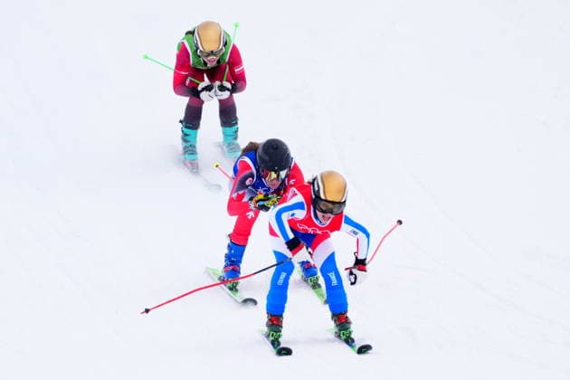 February 20, 2026, Livigno, Italy: Canada s Brittany Phelan, centre, rides behind France s Jade Grillet-Aubert, centre, during the women s ski cross 1 8 finals at the Milano Cortina 2026 Winter Olympic Games, Olympische Spiele, Olympia, OS in Livigno, Italy, Friday, Feb. 20, 2026. Canada News - February 20, 2026  - ZUMAc35_ 20260220_zaf_c35_007 Copyright: xSeanxKilpatrickx