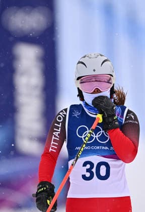 (260220) -- LIVIGNO, Feb. 20, 2026 -- Zhang Xuelian of China reacts after crossing the finish line during the freestyle skiing women s ski cross seeding at the Milan-Cortina 2026 Olympic Winter games, Winterspiele,Spiele, Summer games in Livigno, Italy, Feb. 20, 2026. ) (MICO2026)ITALY-LIVIGNO-OLYMPIC WINTER GAMES-FREESTYLE SKIING-WOMEN S SKI CROSS-SEEDING ZhangxHongxiang 