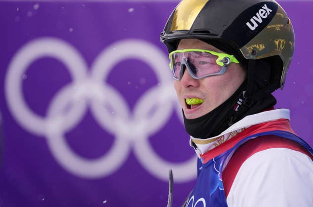 (260220) -- LIVIGNO, Feb. 20, 2026 -- Qi Guangpu of China reacts during the freestyle skiing men s aerials final 1 at the Milan-Cortina 2026 Olympic Winter games, Winterspiele,Spiele, Summer games in Livigno, Italy, Feb. 20, 2026. ) (MICO2026)ITALY-LIVIGNO-OLYMPIC WINTER GAMES-FREESTYLE SKIING-MEN S AERIALS-FINAL HuxChao 