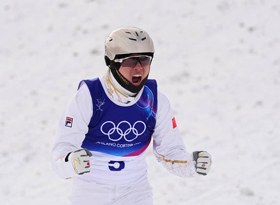(260220) -- LIVIGNO, Feb. 20, 2026 -- Gold medalist Wang Xindi of China celebrates winning after the freestyle skiing men s aerials final 2 at the Milan-Cortina 2026 Olympic Winter games, Winterspiele,Spiele, Summer games in Livigno, Italy, Feb. 20, 2026. ) (MICO2026)ITALY-LIVIGNO-OLYMPIC WINTER GAMES-FREESTYLE SKIING-MEN S AERIALS-FINAL WuxHuiwo 