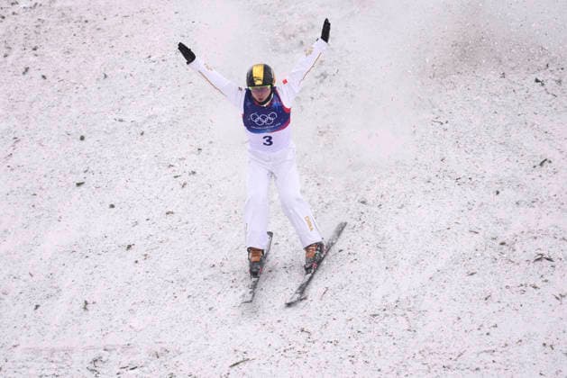 (260220) -- LIVIGNO, Feb. 20, 2026 -- Qi Guangpu of China competes during the freestyle skiing men s aerials final 1 at the Milan-Cortina 2026 Olympic Winter games, Winterspiele,Spiele, Summer games in Livigno, Italy, Feb. 20, 2026. ) (MICO2026)ITALY-LIVIGNO-OLYMPIC WINTER GAMES-FREESTYLE SKIING-MEN S AERIALS-FINAL HuxChao 