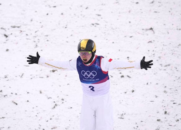 (260220) -- LIVIGNO, Feb. 20, 2026 -- Qi Guangpu of China reacts during the freestyle skiing men s aerials final 1 at the Milan-Cortina 2026 Olympic Winter games, Winterspiele,Spiele, Summer games in Livigno, Italy, Feb. 20, 2026. ) (MICO2026)ITALY-LIVIGNO-OLYMPIC WINTER GAMES-FREESTYLE SKIING-MEN S AERIALS-FINAL HuxChao 