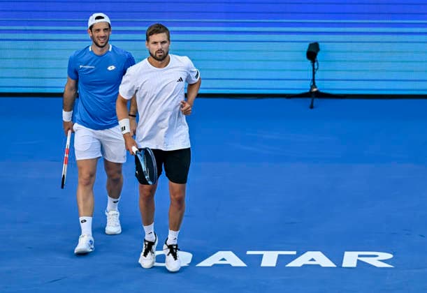 ATP, Tennis Herren Qatar ExxonMobil Open-Doubles Final Julian Cash (L) and Lloyd Glasspool of Great Britain competes against Harri Heliovaara of Finland and Henry Patten of Great Britain in the Doubles Final match at the ATP men s Qatar ExxonMobil Open 2026 tennis tournament at the Khalifa International Tennis Complex in Doha, Qatar, on February 20, 2026. DOHA Qatar Copyright: xNOUSHADx