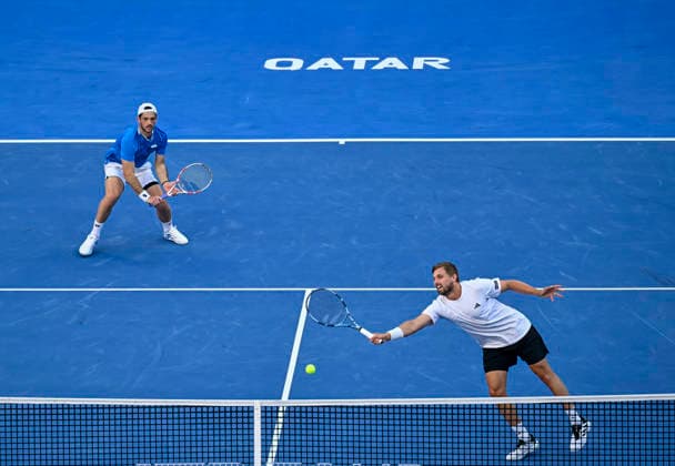 ATP, Tennis Herren Qatar ExxonMobil Open-Doubles Final Julian Cash (L) and Lloyd Glasspool of Great Britain competes against Harri Heliovaara of Finland and Henry Patten of Great Britain in the Doubles Final match at the ATP men s Qatar ExxonMobil Open 2026 tennis tournament at the Khalifa International Tennis Complex in Doha, Qatar, on February 20, 2026. DOHA Qatar Copyright: xNOUSHADx